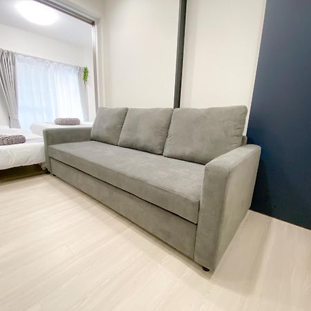 Residential Hotel Glitter Usjまで1駅5分 Osaka Bagian luar foto