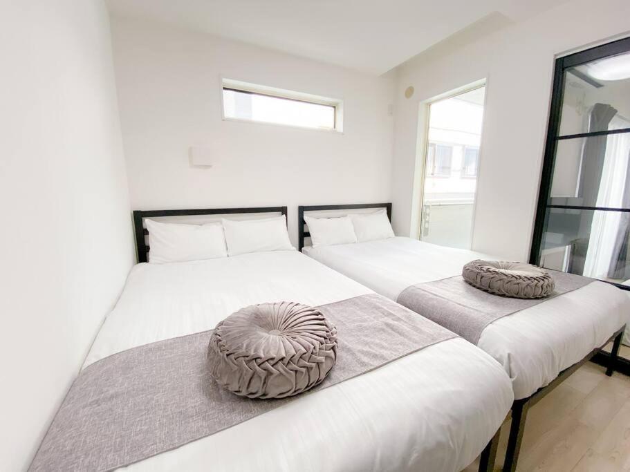 Residential Hotel Glitter Usjまで1駅5分 Osaka Bagian luar foto
