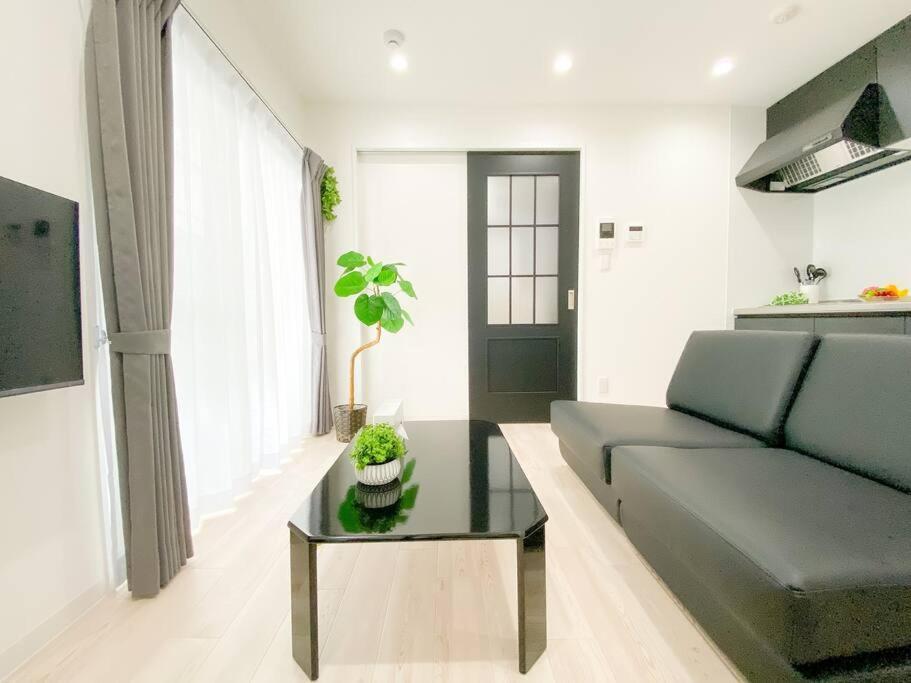 Residential Hotel Glitter Usjまで1駅5分 Osaka Ruang foto