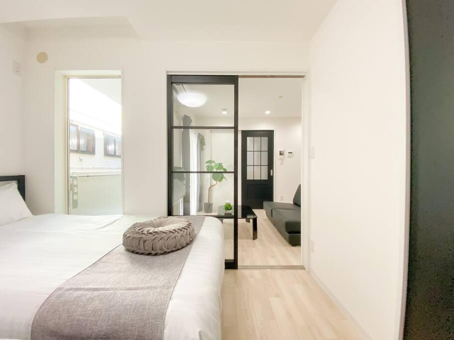 Residential Hotel Glitter Usjまで1駅5分 Osaka Ruang foto