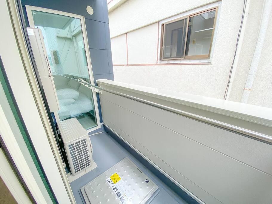 Residential Hotel Glitter Usjまで1駅5分 Osaka Ruang foto