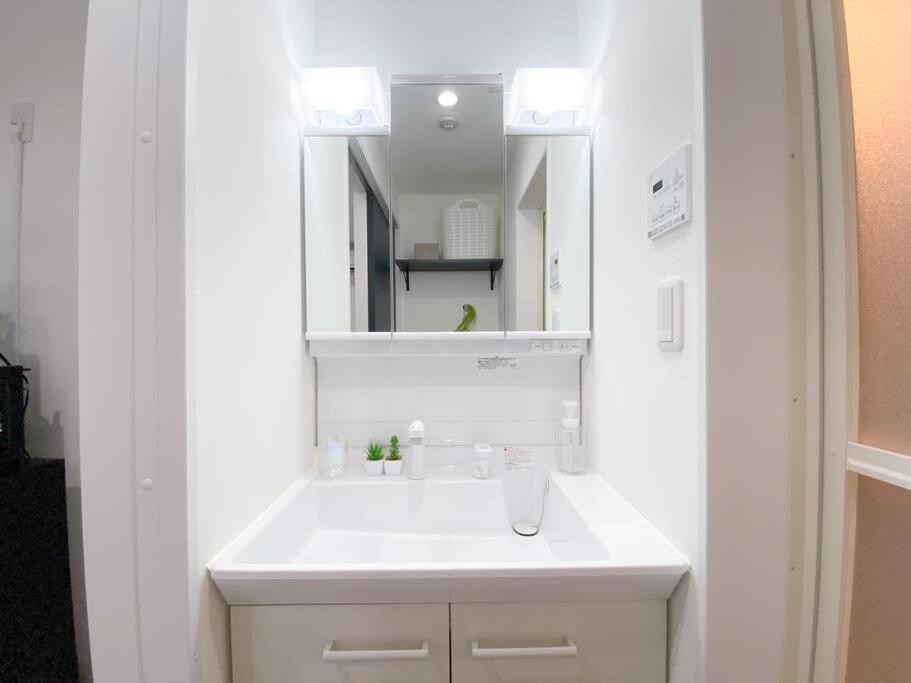 Residential Hotel Glitter Usjまで1駅5分 Osaka Ruang foto