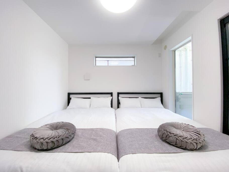 Residential Hotel Glitter Usjまで1駅5分 Osaka Bagian luar foto