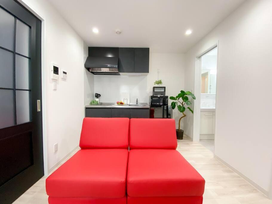 Residential Hotel Glitter Usjまで1駅5分 Osaka Ruang foto