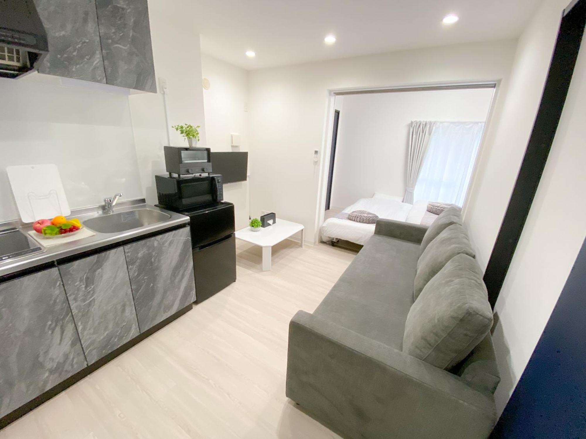 Residential Hotel Glitter Usjまで1駅5分 Osaka Bagian luar foto