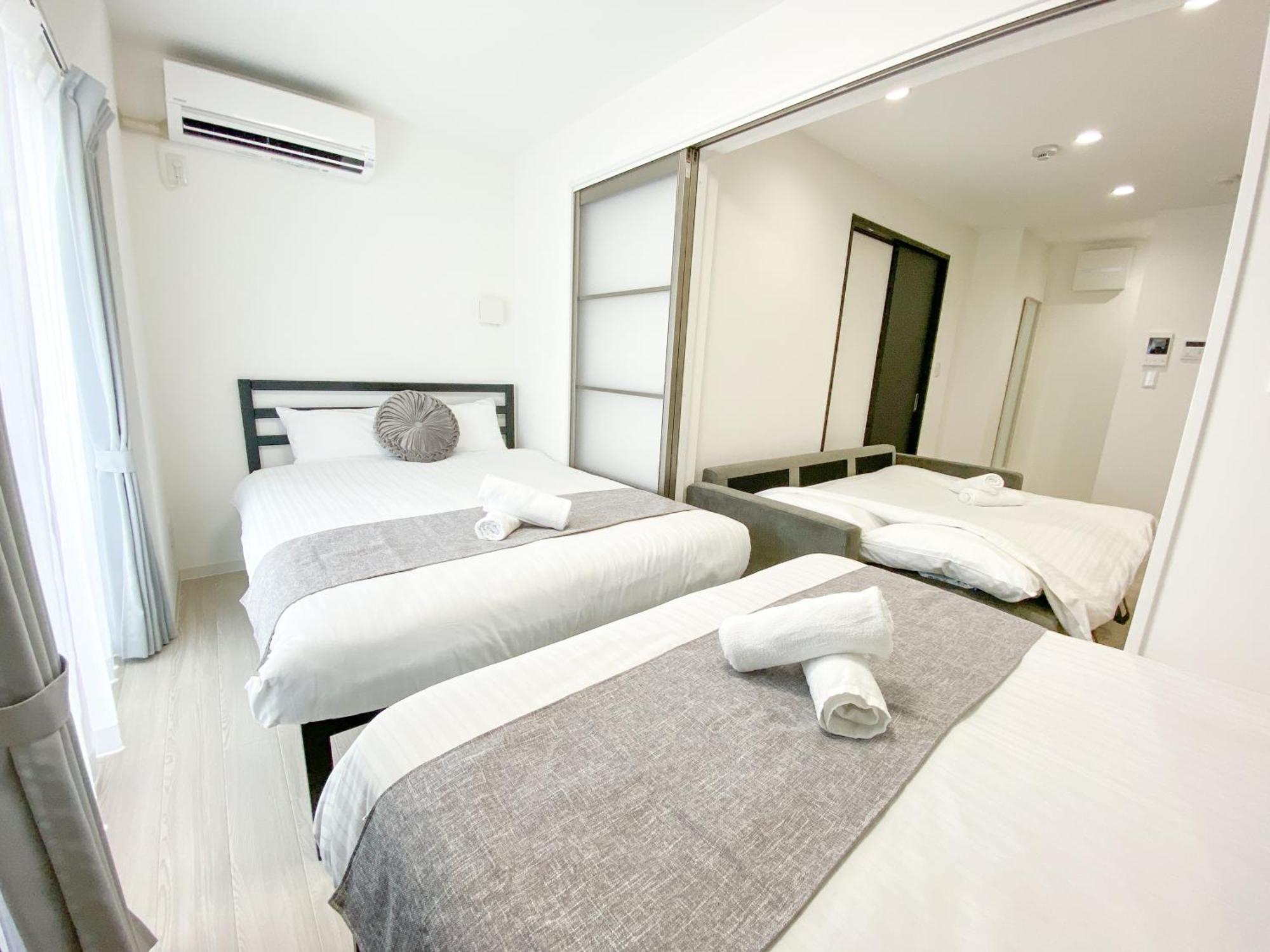 Residential Hotel Glitter Usjまで1駅5分 Osaka Ruang foto